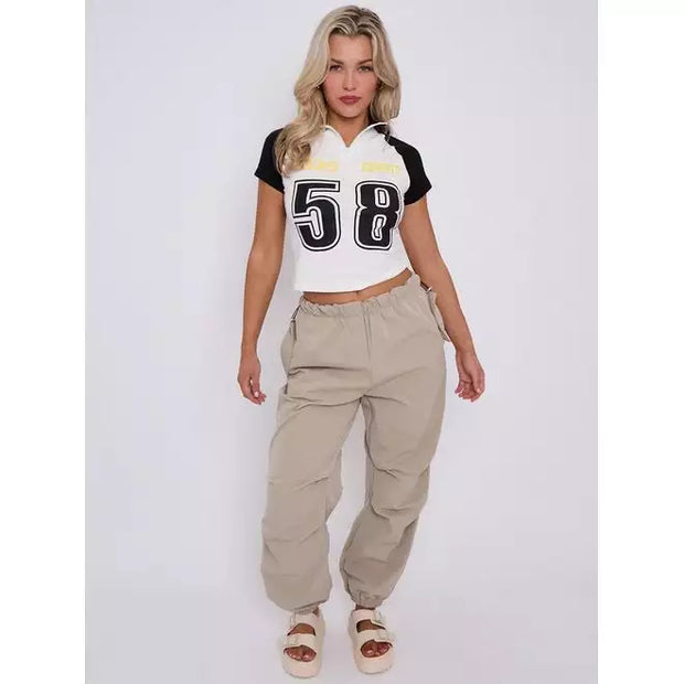 Looks Great Graphic Half Zip Crop Top - Beyond paradise